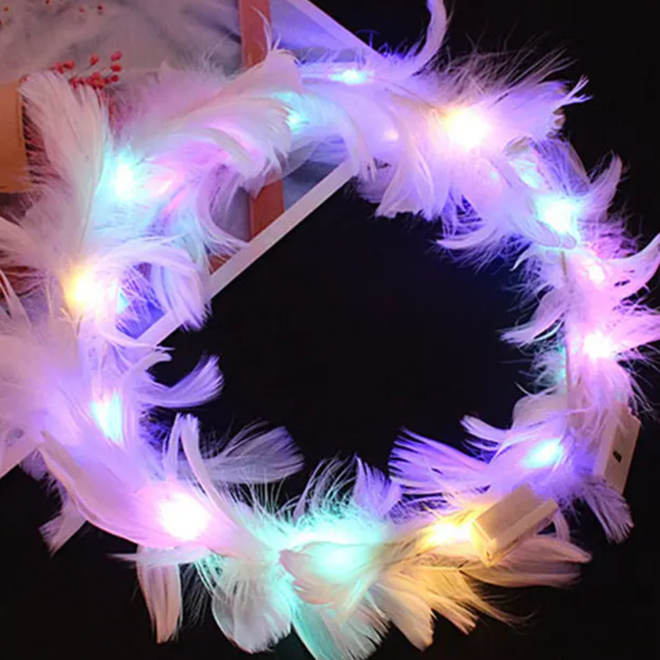 Corona de plumas LED